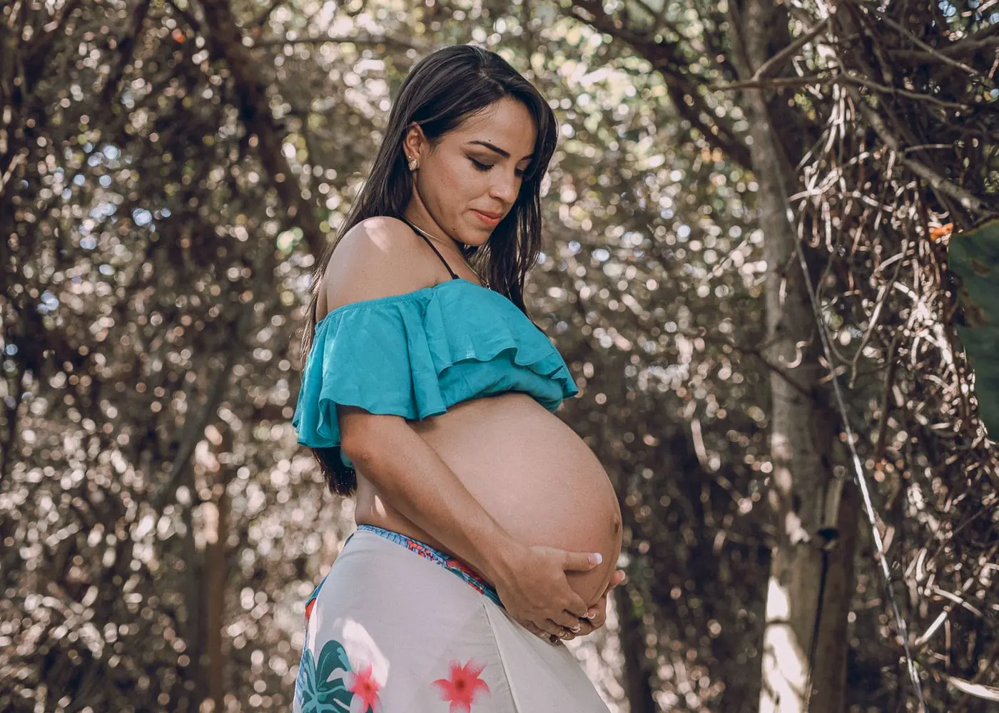A pregnant woman outdoors